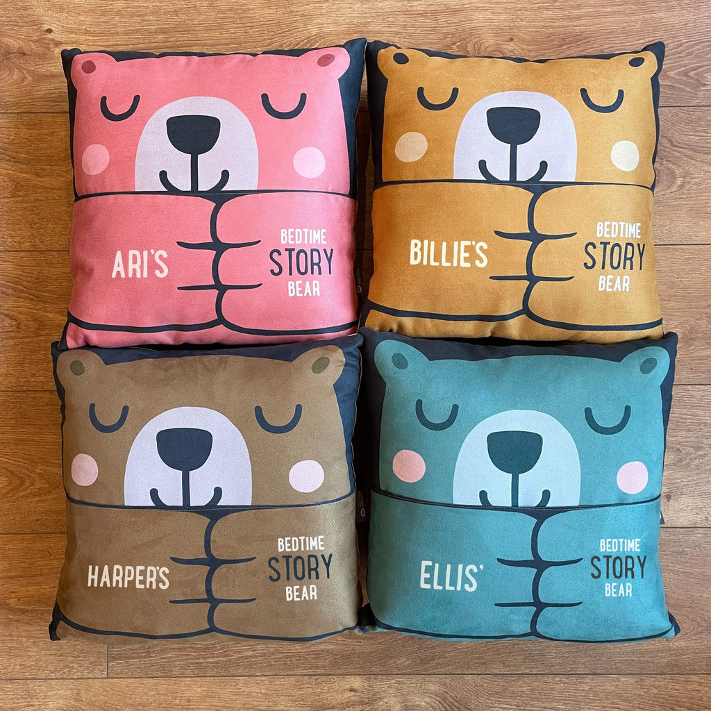 The four available colours of the personalised bedtime story bear cushion with pocket. Available in pink, yellow, brown or blue. 