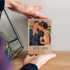 A beautifully crafted personalised wooden photo block. On the block is a photo of a couple on their wedding day, under the photo are the words '5 years - 20.09.2014'.