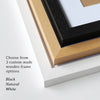The image shows the corner of three frames and the words 'choose from 3 custom made wooden frame options, black, natural, white.'