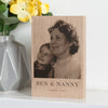 The image showcases a personalised photo block with a black and white photo of a Grandmother and Grandson printed on it. Underneath the photo on the block are the words 'Ben & Nanny, August 1969'.